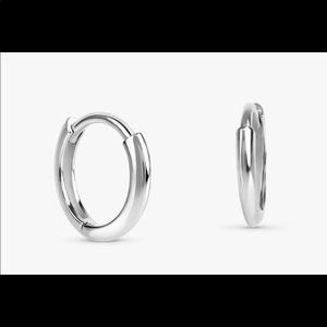 14k solid white gold huggie earrings.